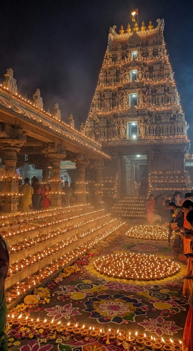 Deepawali diyas in a temple courtyard